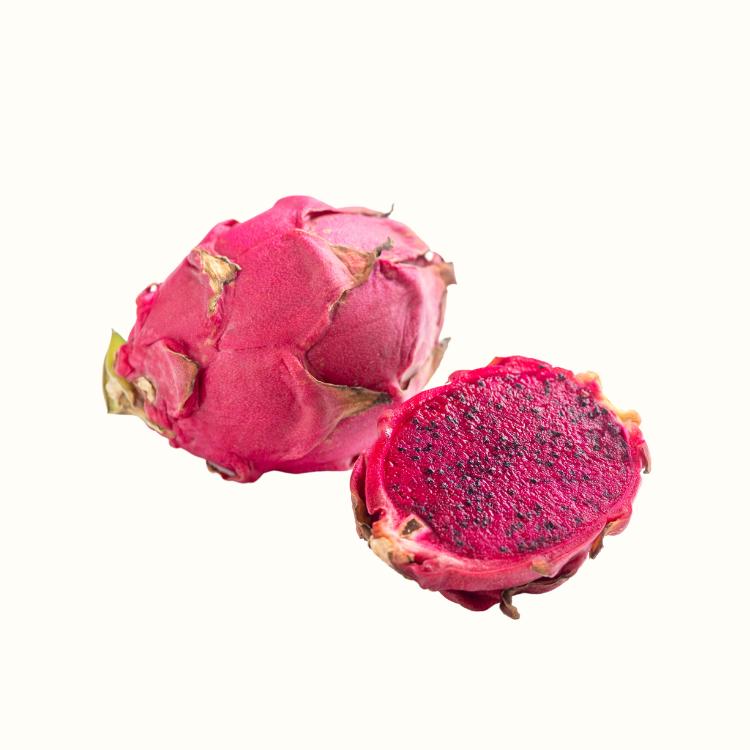 Close-up of ripe dragon fruit with vibrant skin and scales