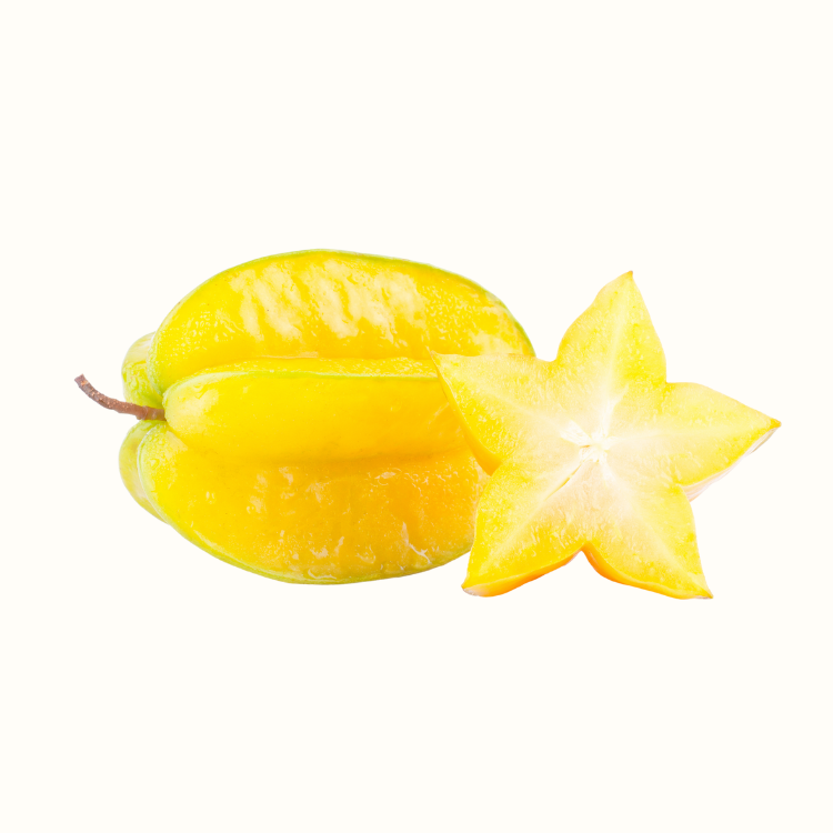 Close-up of ripe starfruit with glossy yellow skin and star-shaped slices