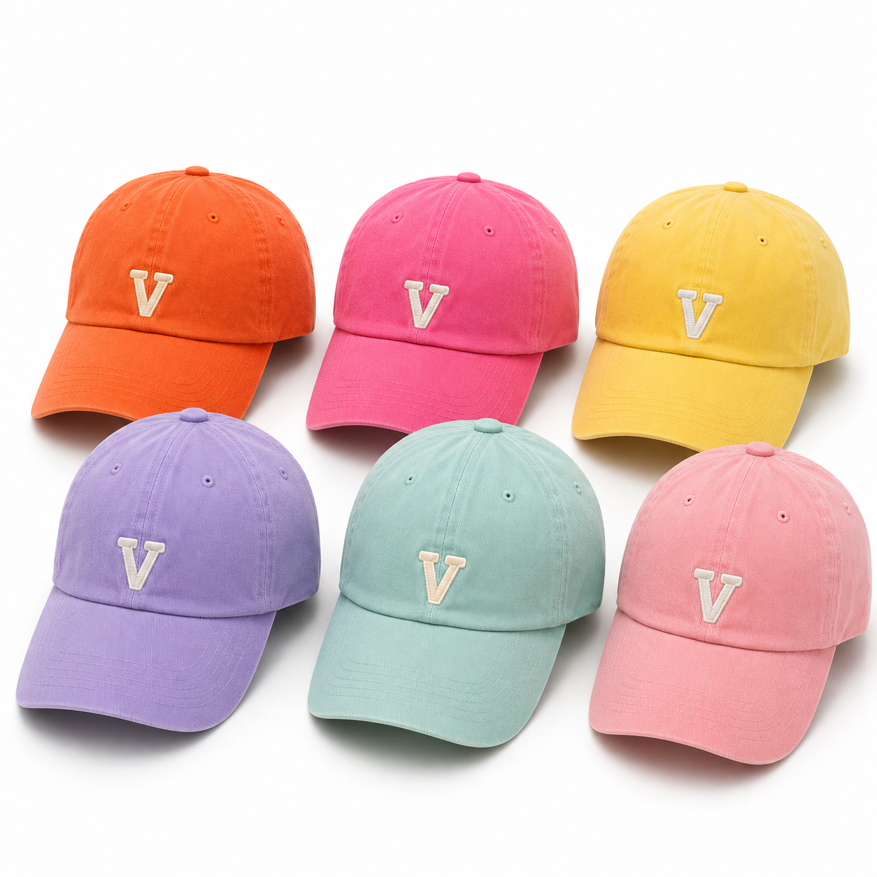 Six colorful baseball caps with a letter 'V' on a white background