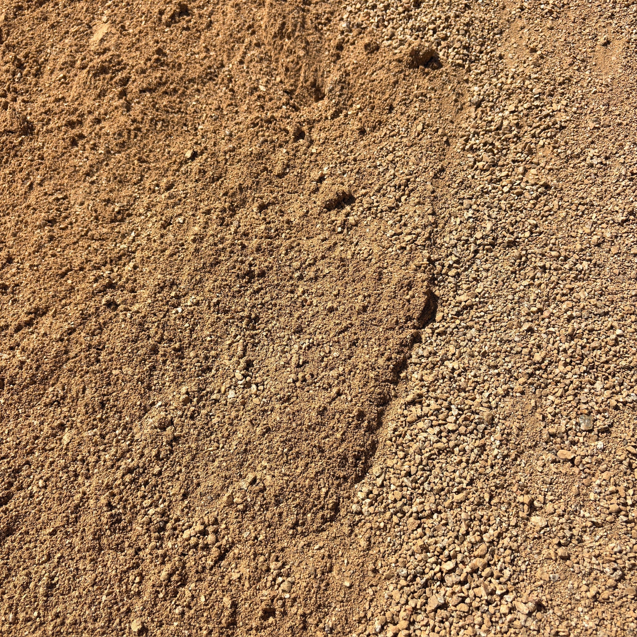 Close-up of textured brown Granite Fines