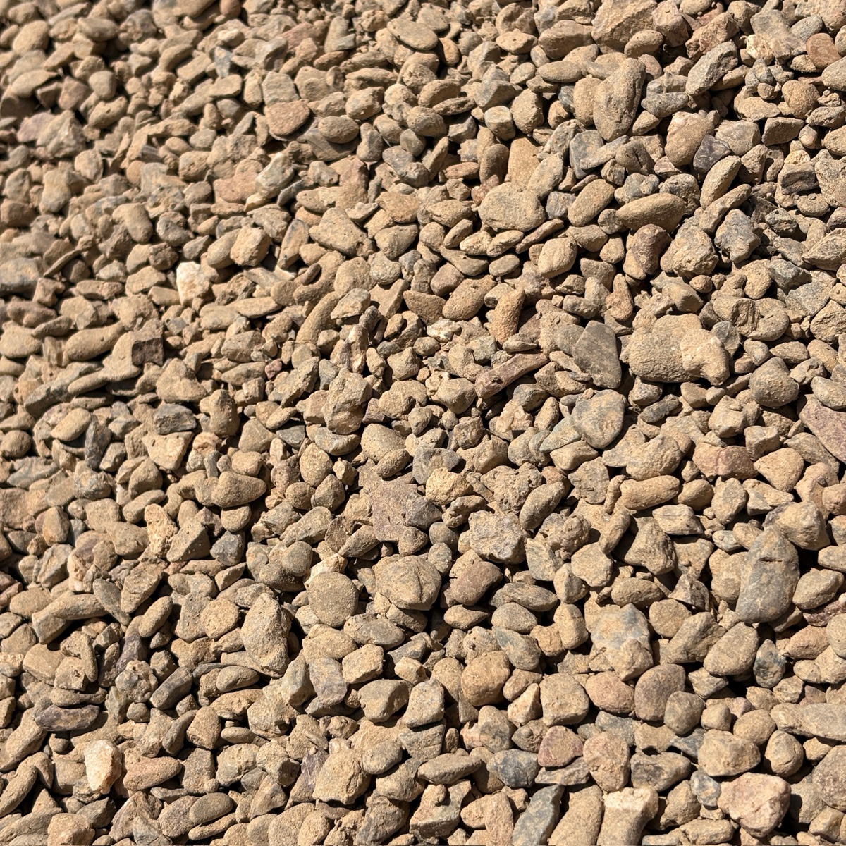 Close-up of small brown stones Pea Gravel